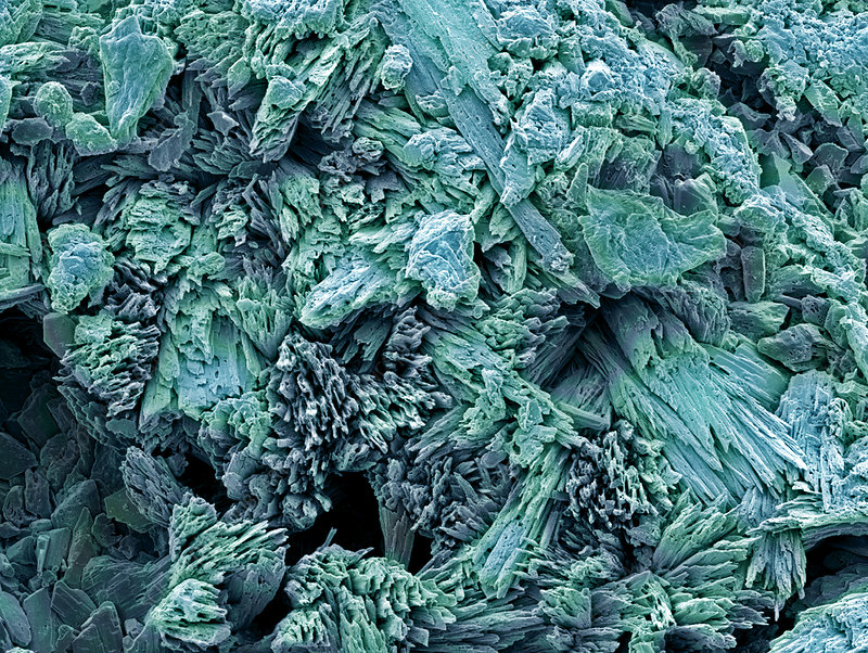 Microsurface of gypsum, coloured SEM by Steve Gschmeissner.